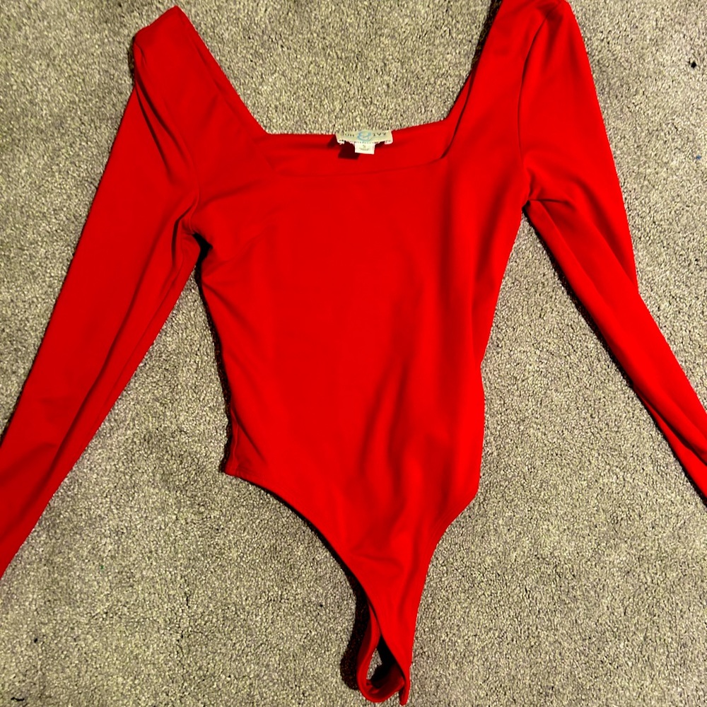 Francesca’s red bodysuit